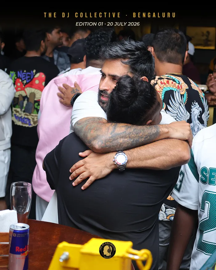 A long embrace between two people who clearly already knew each other