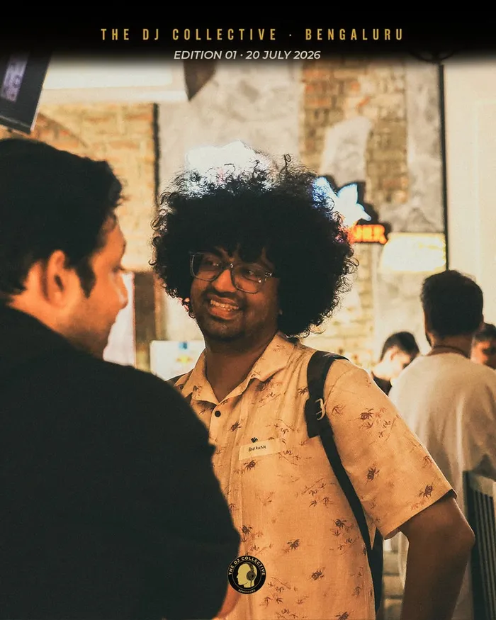 A group talking and laughing in the crowd