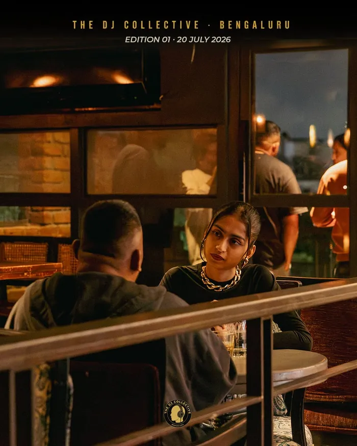 People seated and talking on the mezzanine